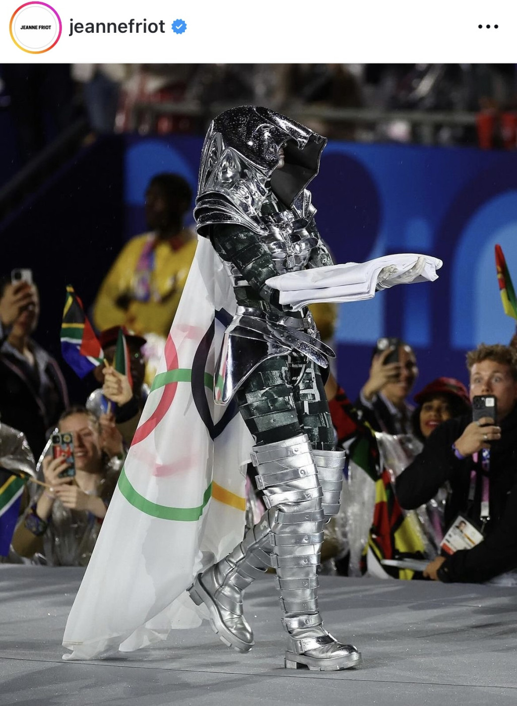 Mysterious flag bearer In silver armour in leather By Jeanne Friot