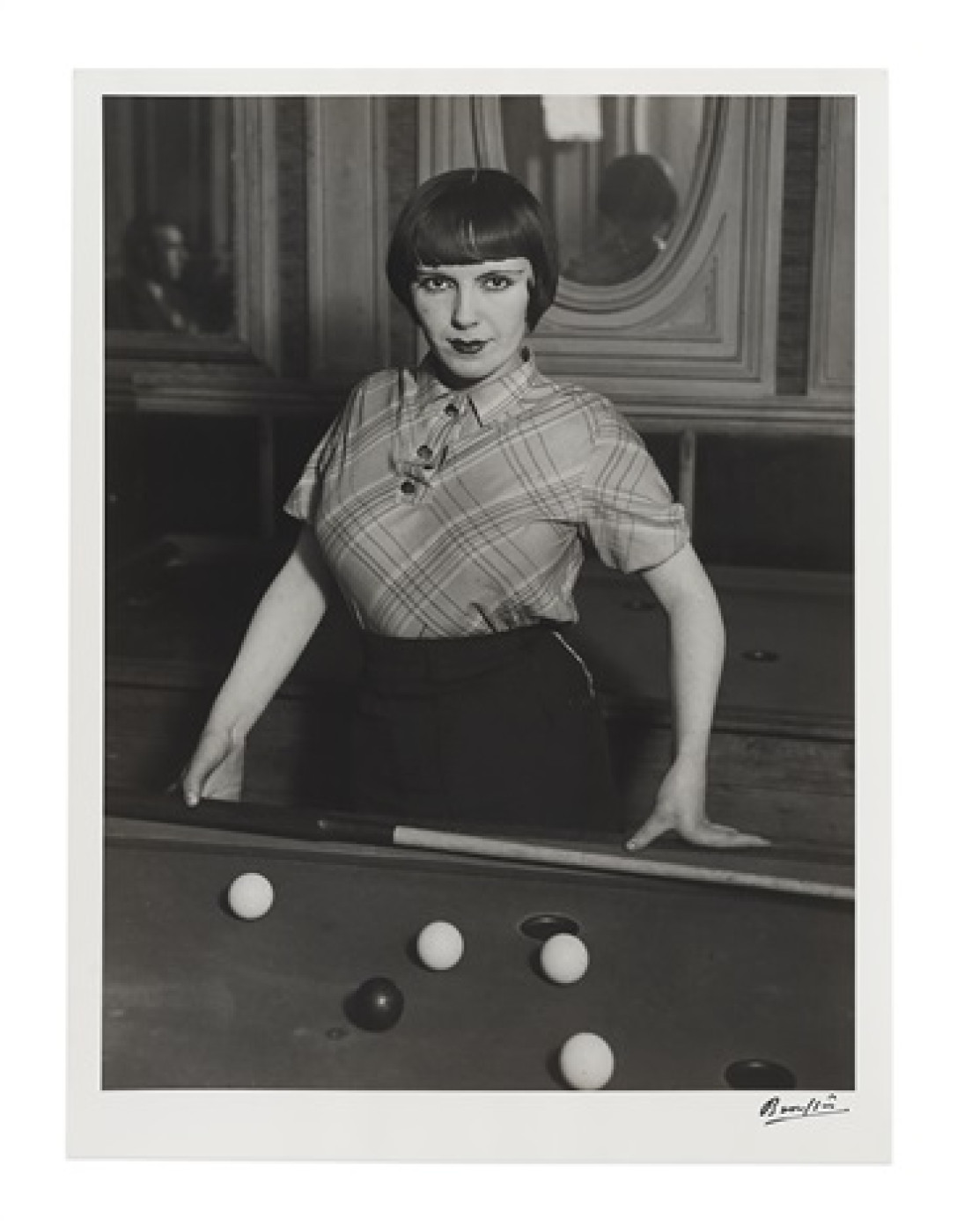 Brassaï (French/Hungarian, 1899–1984) Title: Fille de joie jouant au billard russe, boulevard Rochechouart, Montmartre (A prostitute playing Russian billiards, Boulevard Rochechouart, Montmartre), ca. 1932