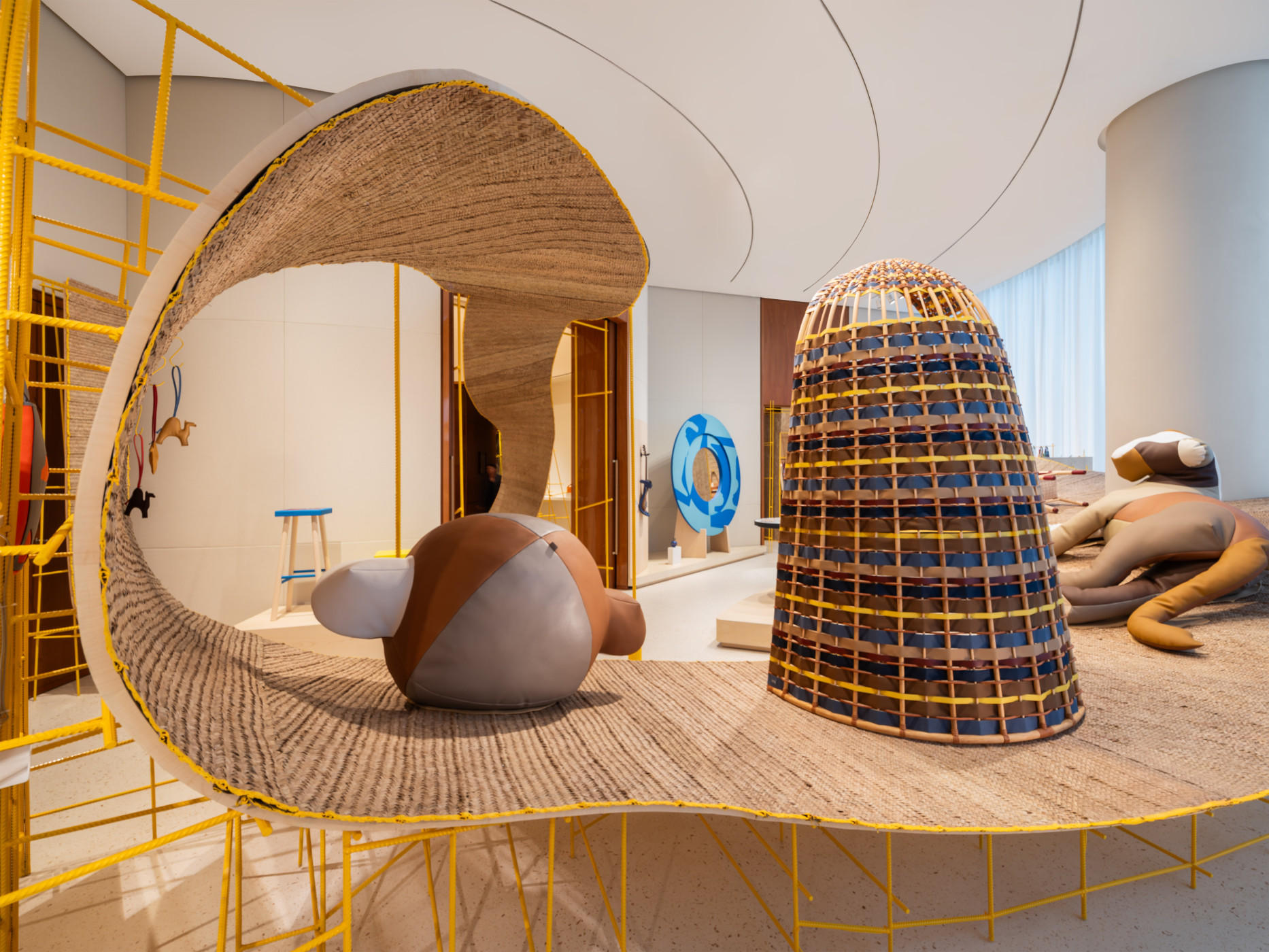 Palm-leaf scenography designed by Godefroy de Virieu for Hermès petit h, Dubai, 2026. Courtesy of Hermès.