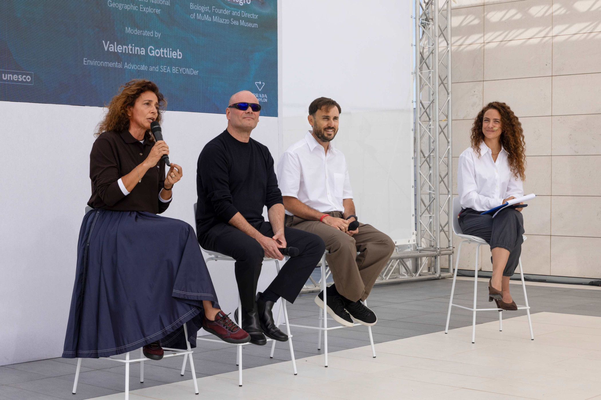 From left to right: Elisabetta Zavoli, Enzo Barracco, Carmelo Isgrò and Valentina Gottlieb. SEA BEYOND Ocean&Climate Village Luna Rossa Base - Courtesy of Prada Group.